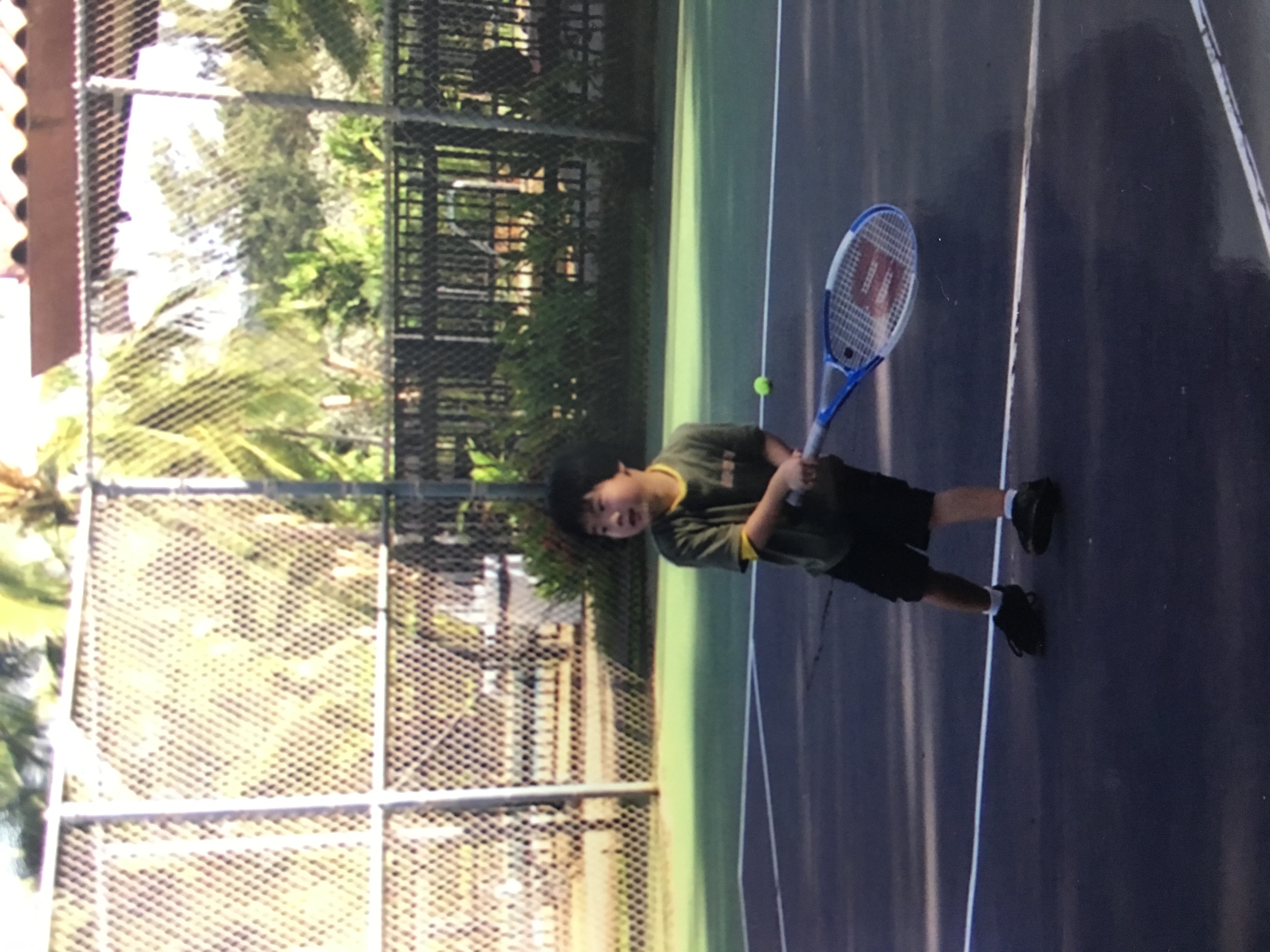 Reyn Miyagawa playing tennis